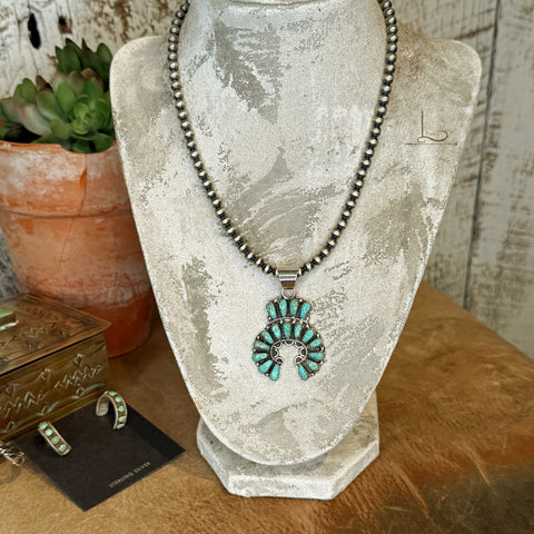 The Begay Sterling Silver Pearl Neckace with Turquoise Naja Pendant