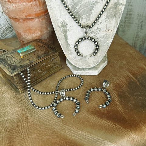 The Sterling Silver Pearl Naja Pendant