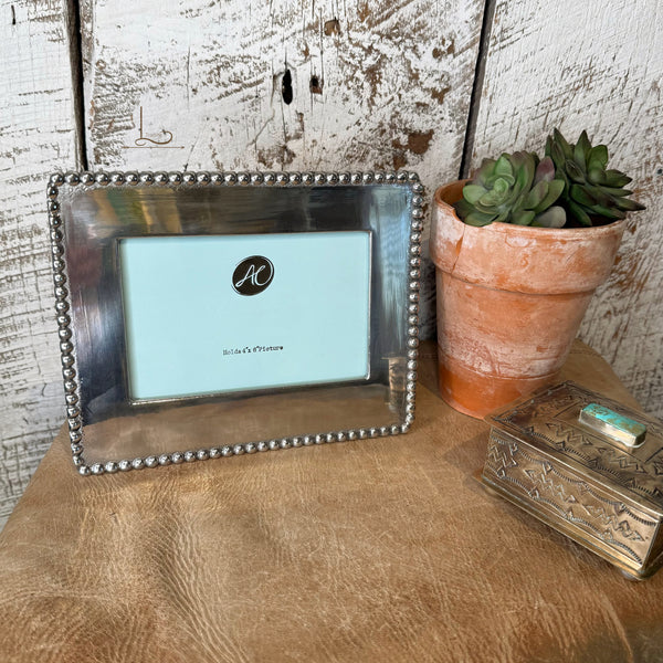 The Silver Beaded Frame