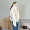 The Equestrian Cardigan in Cream