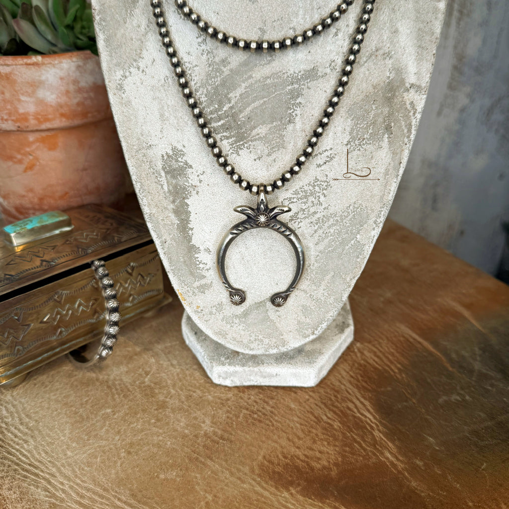 The Sterling Silver Stamped Naja Pendant