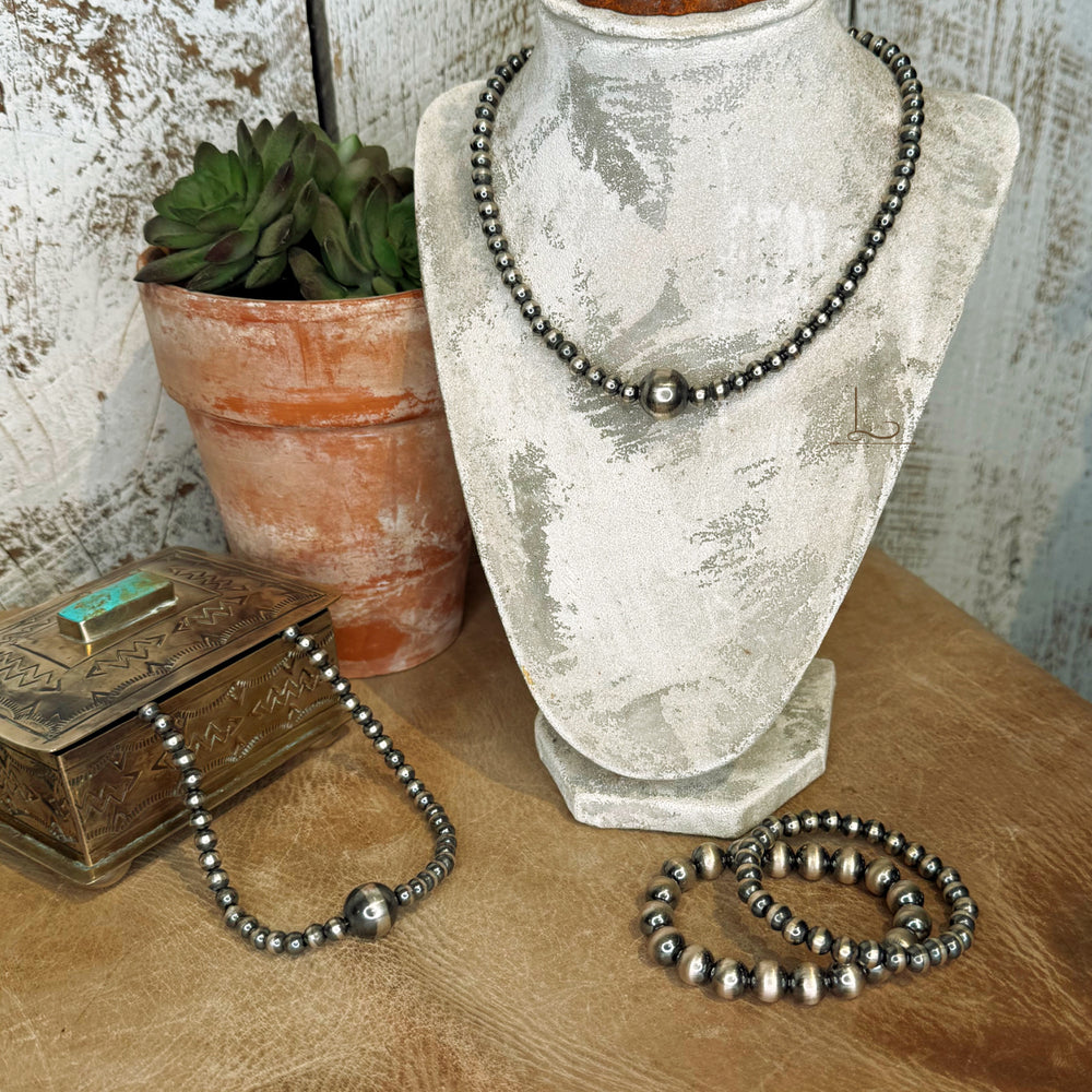 The Sterling Silver Pearls with 14mm Accent Pearl