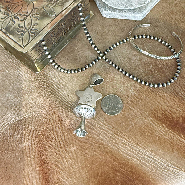 The Turquoise Star Stamped Squash Blossom Pendant