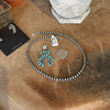 The Begay Sterling Silver Pearl Neckace with Turquoise Naja Pendant