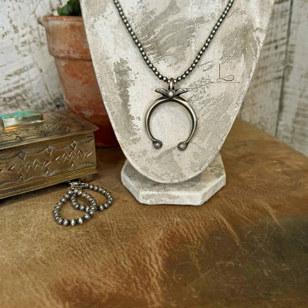 The Sterling Silver Stamped Naja Pendant